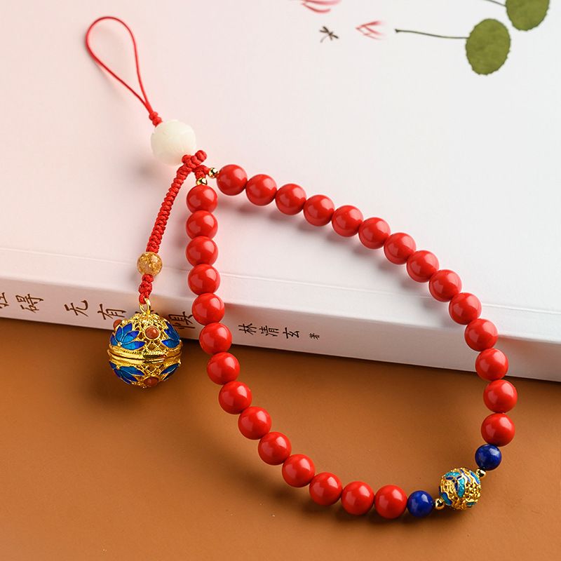 Phone Accessories Ideas - สายคล้องโทรศัพท์สีแดงสั้นลายซินนาบาร์สุดสร้างสรรค์ พร้อมจี้ลูกบอลเคลือบสีหอมสำหรับผู้หญิง แฟชั่นเครื่องประดับมือถือ ไอเดียของขวัญ